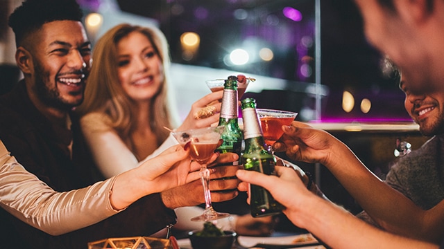 Friends drinking alcohol together.